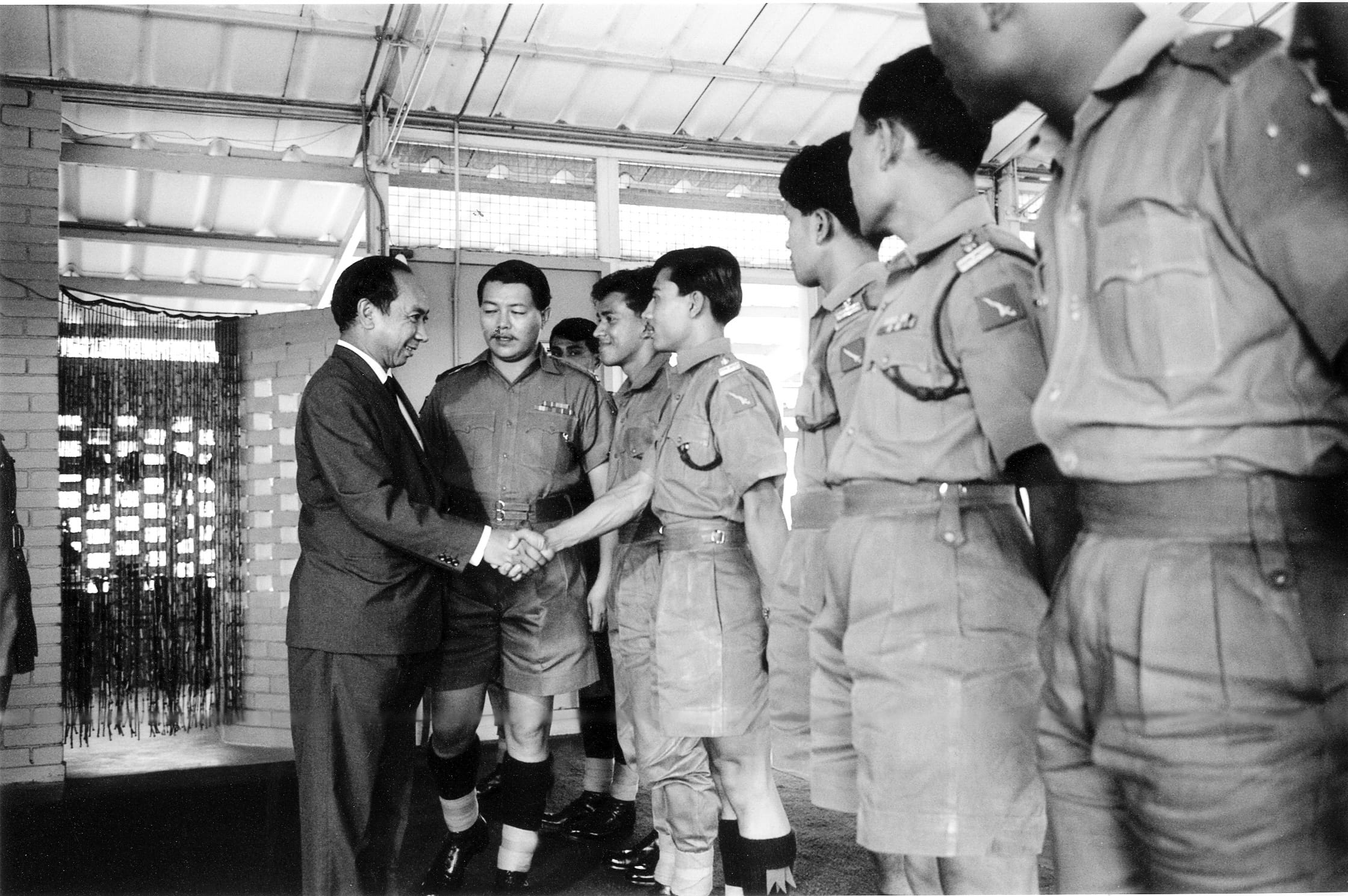 Goh Keng Swee meeting the 1st and 2nd Singapore Infantry Regiments, 1965. Ministry of Information, Communications and the Arts.